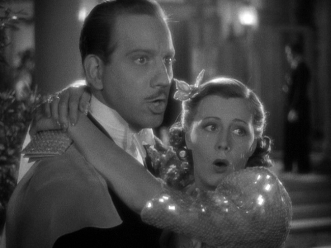 Melvyn Douglas, Irene Dunne in Theodora Goes Wild