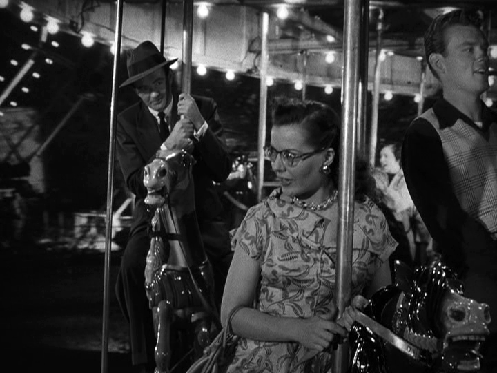 Robert Walker, Laura Elliot in Strangers on a Train