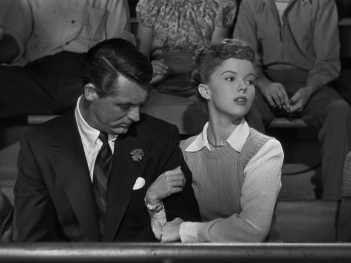 Cary Grant, Shirley Temple watch basketball together in "The Bachelor and the Bobby Soxer"