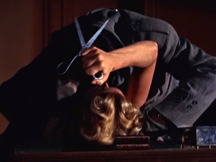 Grace Kelly attempts to save herself from a would-be murderer.