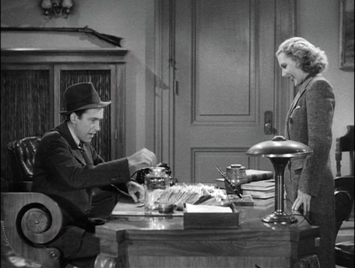 James Stewart and Jean Arthur count the donations from very young constituents,