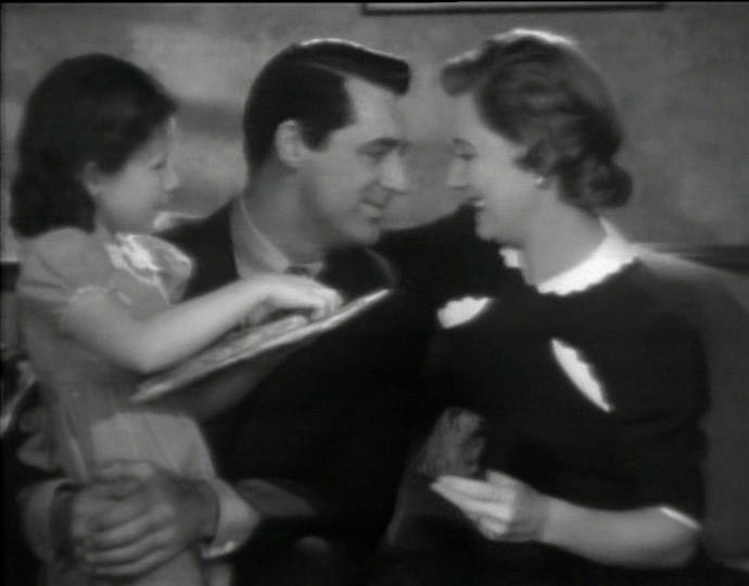 Cary Grant as Rogers Adams celebrates wife Julie's (Irene Dunne) birthday with their daughter.