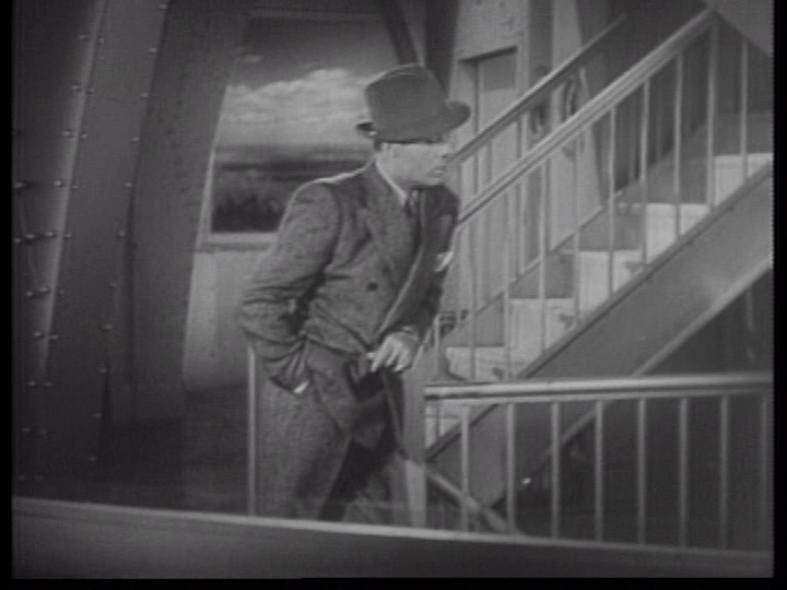 Charles Boyer waits for Irene Dunne at the Empire State Builidng.