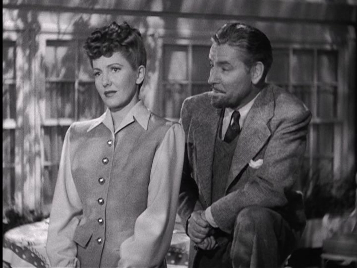 Ronald Colman proposes to Jean Arthur in "The Talk of the Town."