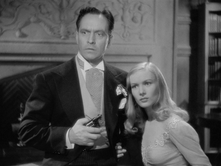 Wallace (Fredric March) and Jennifer (Veronica Lake) listen to her father describe how Wallace which reach the end of his career--and his life.describe how