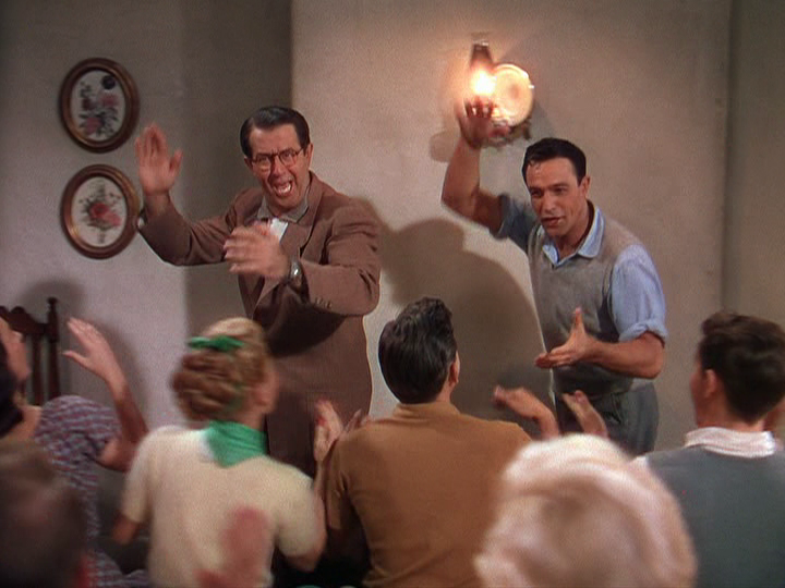 Phil Silvers and Gene Kelly dance for the troupe in "Summer Stock."
